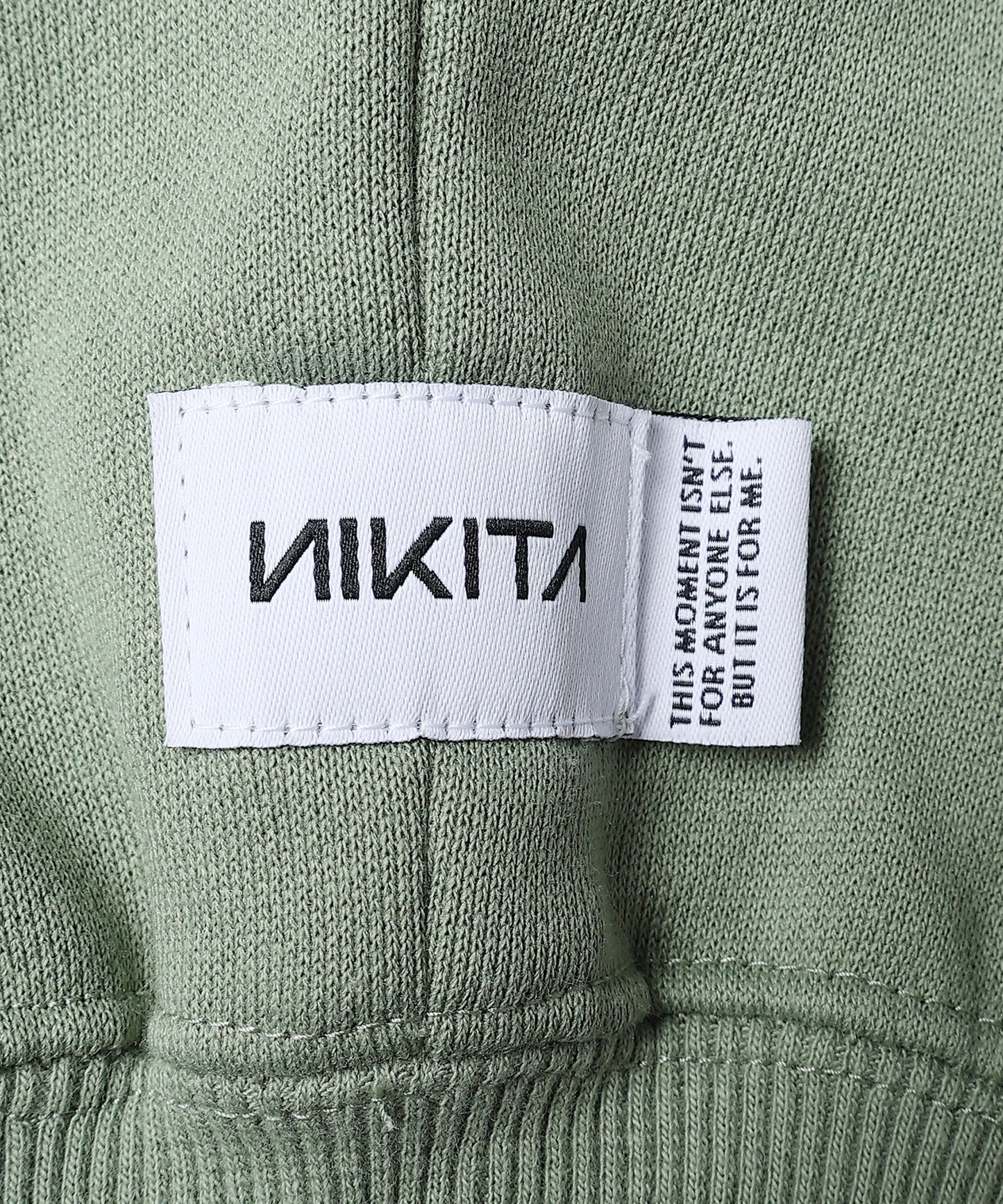 NIKITA HALF ZIP SWEAT