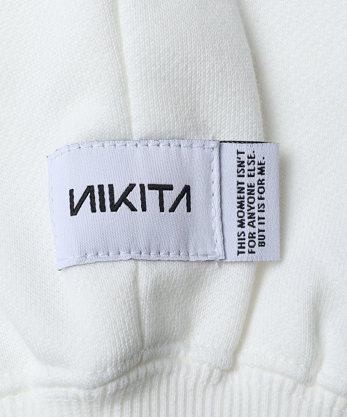 NIKITA HALF ZIP SWEAT